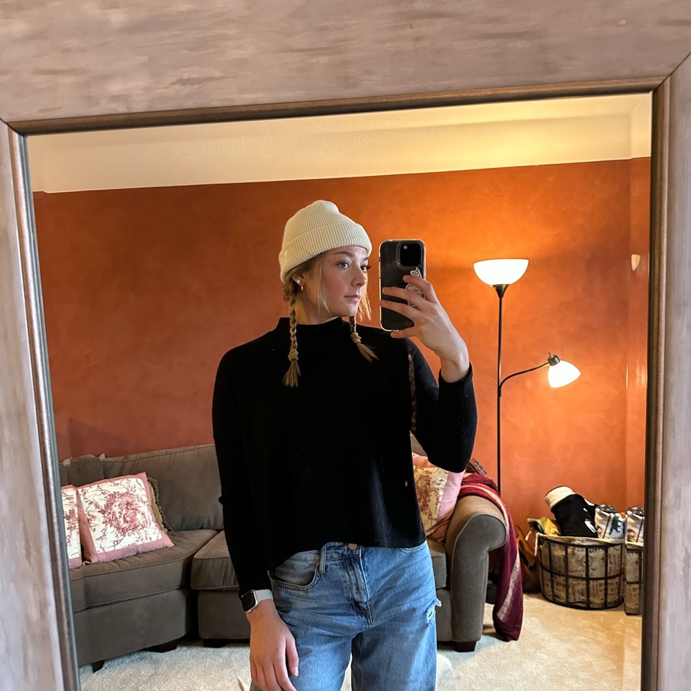 Divided black sweater